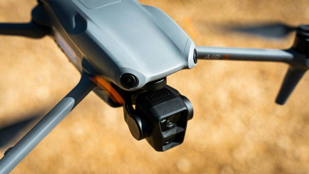 pexels-photo-18660493-18660493 View of Dji Air 3 drone flying in the forest in south of France.
